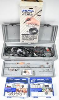 Dremel electric tool with flex shaft and attachments.