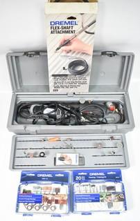 Dremel electric tool with flex shaft and attachments.