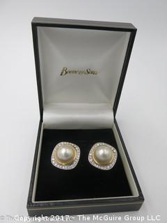 Pair of pearl (9mm x 9mm x 6mm deep)earrings surrounded by diamonds and set in 18k yellow gold; 19.6g; #1220 