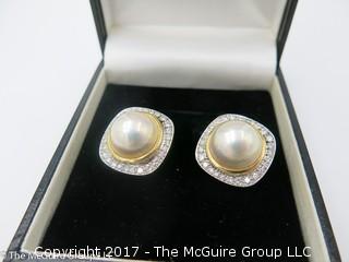 Pair of pearl (9mm x 9mm x 6mm deep)earrings surrounded by diamonds and set in 18k yellow gold; 19.6g; #1220 