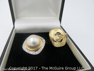 Pair of pearl (9mm x 9mm x 6mm deep)earrings surrounded by diamonds and set in 18k yellow gold; 19.6g; #1220 