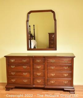 Cherry 12 Drawer Chest with Matching Wall Mirror.  Made by Pennsylvania House. Dresser measures 20" x  34" x 63" and mirror measures 30" x 40"