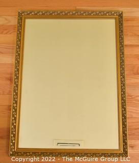 Gilt Framed Wall Mirror.  Measures 23" x 31"