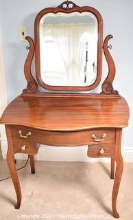 Vintage Walnut Dressing Table or Vanity with Beveled Tilting Mirror. 36W x 19D x 53"T 