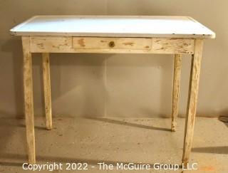 Vintage Mid Century White Enamel Top Work Table with Wood Legs. Measures 40"L x 23"W x 30"T