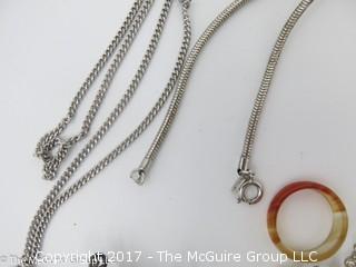 Collection of jewelry including rings, earrings, chains and a pendant; # 1226