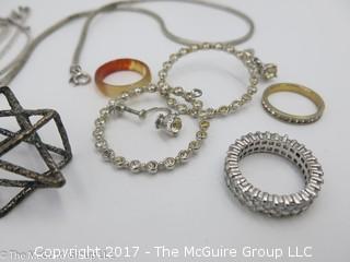 Collection of jewelry including rings, earrings, chains and a pendant; # 1226