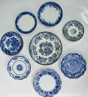 Eight (8) Vintage Blue and White Ceramic Plates, Various Makers.  