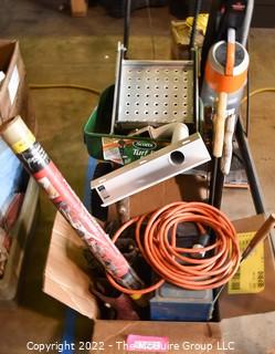 Collection of Misc. tools including Post Hole Diggers, Electric Vacuum, 3 crosscut saws, Extension Cord, Roll of Carpet Saving Film, Screw Case and Grass/Fertilizer Seeder.   