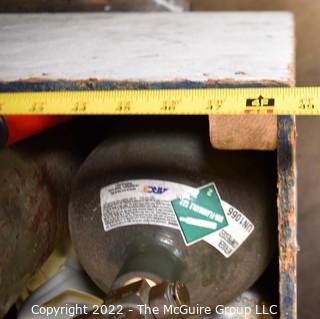 Large Box of canisters used by HVAC and Electrical Contractors; including coolant.  Does include wooden box, but does not include cart. Buyer must produce Refrigerant Handling Certificate at removal.  Encourage inspection, Tuesday, April 26, 2-4pm  