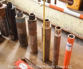 Core Drill with 7 Diamond Core Bits and 10' Tension Bar.  Needs new water valve.  