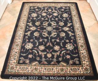 Machine Made Area Rug.  46" x 65".