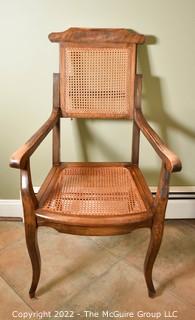 Cane Arm Chair with Adjustable Back that Raises and Lowers.   {Note: Description was altered on 4.28.22 @ 8:57pm ET}