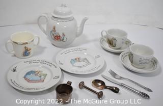 Set of Children's Beatrix Potter Peter Cottontail Porcelain Dinnerware and Flatware.  Includes Sterling Baby Cup and Rattle.