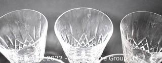 Set of Nine (9) Waterford Lismore Crystal Wine Goblets.  A few small chips on rims. 