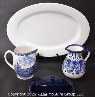 Two Blue and White Pitchers, Blue Pottery Butter Dish and White Porcelain Platter. 