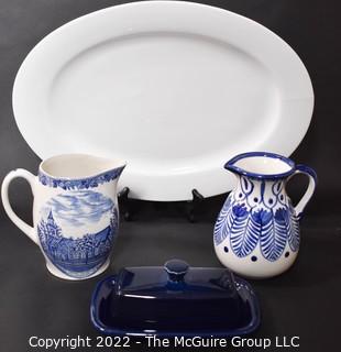 Two Blue and White Pitchers, Blue Pottery Butter Dish and White Porcelain Platter. 