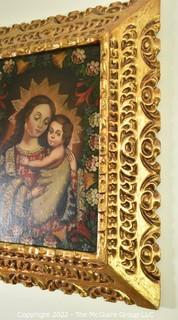 Folk Art Oil on Canvas Retablo Of Madonna And Christ Child, Unsigned, Cusco School, Peru. In ornate carved gilt frame. 16" x 19" with Frame. 13" x 9 1/2" Inside Frame.