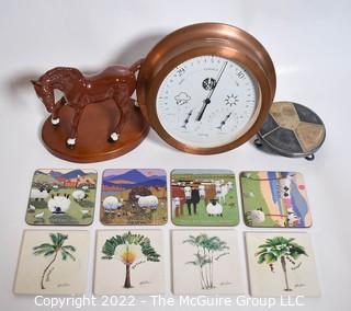 Wall Barometer, Horse Figurine and Coasters.