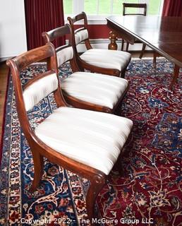 Antique Early Victorian Mahogany Extendable Dining Table with Leaves and Seven (7) White Upholstered Chairs.  96" x 42" x 31".  