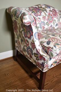 20th Century Chintz Upholstered Settee Loveseat.  One of a pair.  56" long.