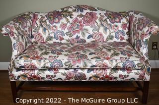 20th Century Chintz Upholstered Settee Loveseat.  One of a pair.  56" long.