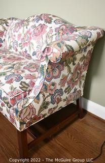 20th Century Chintz Upholstered Settee Loveseat.  One of a pair.  56" long.