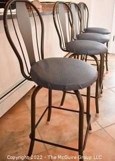 Four (4) Metal Swivel Barstools with Upholstered Seats. 