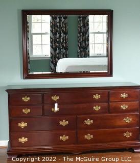 Pennsylvania House Classics Chippendale Style Cherry Chest of Drawers with Mirror.  Features six upper drawers and four larger lower drawers and brass pulls.  Dresser measures 66.0" W x 34.5" H x 19.0" D.  Mirror Measures 48" W x 36" H .