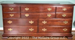 Pennsylvania House Classics Chippendale Style Cherry Chest of Drawers with Mirror.  Features six upper drawers and four larger lower drawers and brass pulls.  Dresser measures 66.0" W x 34.5" H x 19.0" D.  Mirror Measures 48" W x 36" H .