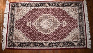 Wool Hand Woven Medallion Center Area Rug on Red Ground.  37" x 67".