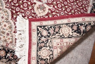 Wool Hand Woven Medallion Center Area Rug on Red Ground.  37" x 67".