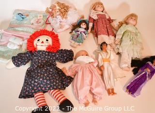 Collection of Dolls Including Raggedy Anne and Aladin Barbie.