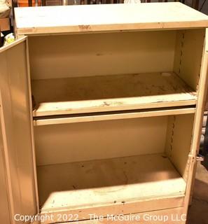 Metal 2 Door Cabinet. Measures 36 x 18 x 42"T