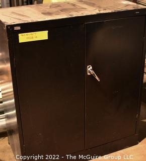 Metal 2 door Cabinet.  Measures 36 x 18 x 42"T