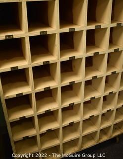 35 Wooden Office Cubbies on Casters. Measures 40W x 24D x 53"T 