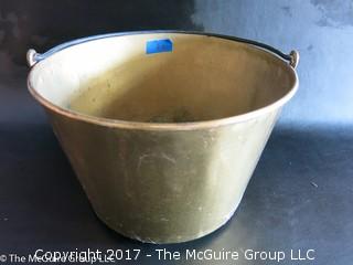 Large brass fireplace bucket ; maker mark stamped on base; 15" diameter at top rim x 10"T 