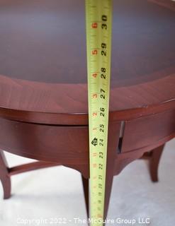 Bombay Company Round Bookmatched Veneer Side Table with Tapered Legs and Four Small Sliver Drawers.  24"D x 26"T.