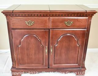 Broyhill Fold Out Buffet Server or Bar Cabinet. 35"T.  x  38"L folded.   59"L when folded out. 