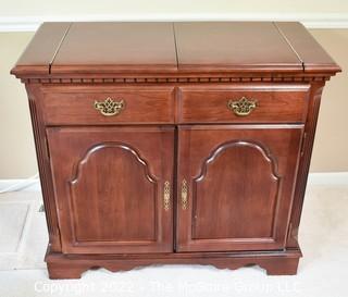 Broyhill Fold Out Buffet Server or Bar Cabinet. 35"T.  x  38"L folded.   59"L when folded out. 