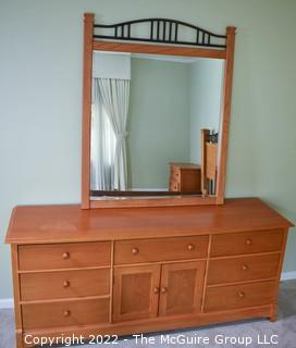 Thomasville Impressions Oak 7 Chest of Drawers with Matching Wall Mirror.  Dresser measures 30" x 18" x  71"L.  Mirror measures 40" x 51".