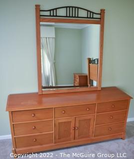 Thomasville Impressions Oak 7 Chest of Drawers with Matching Wall Mirror.  Dresser measures 30" x 18" x  71"L.  Mirror measures 40" x 51".