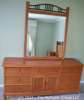 Thomasville Impressions Oak 7 Chest of Drawers with Matching Wall Mirror.  Dresser measures 30" x 18" x  71"L.  Mirror measures 40" x 51".