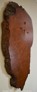 Live Edge Burlwood Slab Wall Clock.  Battery.  Measures 3"D x 21"W x 32"L.