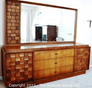 Mid Century Brutalist Low Dresser with Matching Wall Mirror in Walnut Weave Pattern Styled after Paul Evans by Tabago Furniture Company.   Chest of Drawers measures 22" D x 30"T x 78"L.  