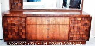 Mid Century Brutalist Low Dresser with Matching Wall Mirror in Walnut Weave Pattern Styled after Paul Evans by Tabago Furniture Company.   Chest of Drawers measures 22" D x 30"T x 78"L.  