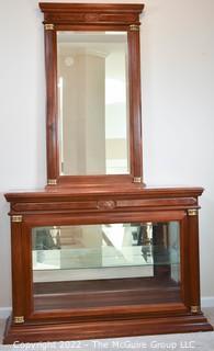 Display case with attached mirror