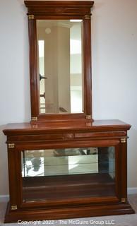 Display case with attached mirror