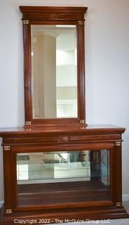 Display case with attached mirror