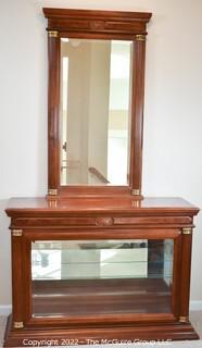 Display case with attached mirror